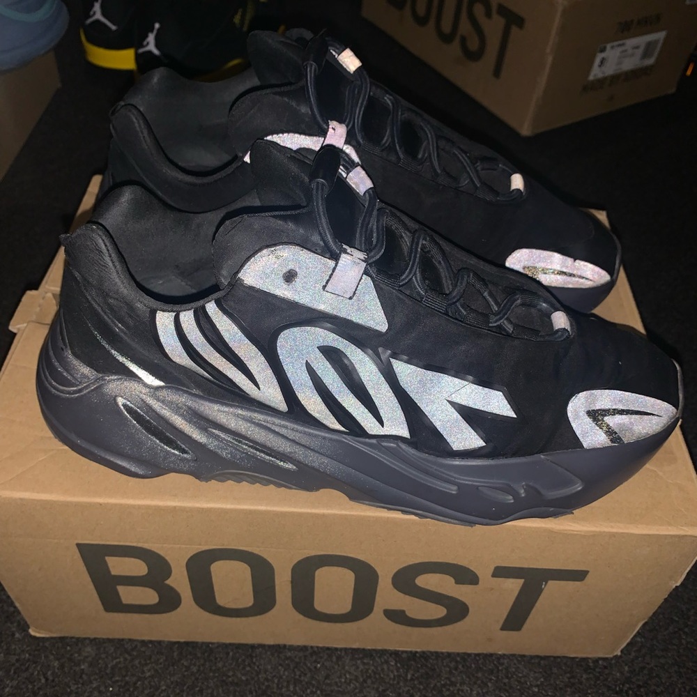 Yeezy Boost 700 MNVN 'Triple Black'.    9 US MEN